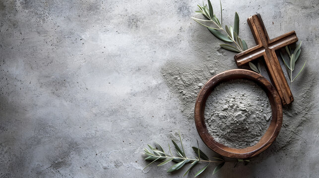 Cross, ashes, and olive leaves on concrete stone background. Ash Wednesday concept