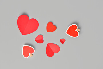 Paper hearts on grey background