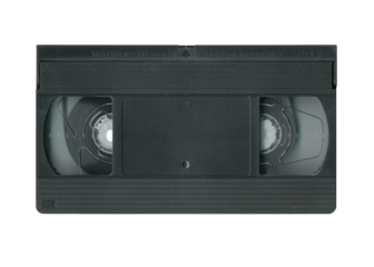 Old vhs cassette tape front, top view isolated. Vintage magnetic videotape movie storage concept studio shot.