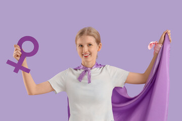 Female superhero with gender of woman on lilac background