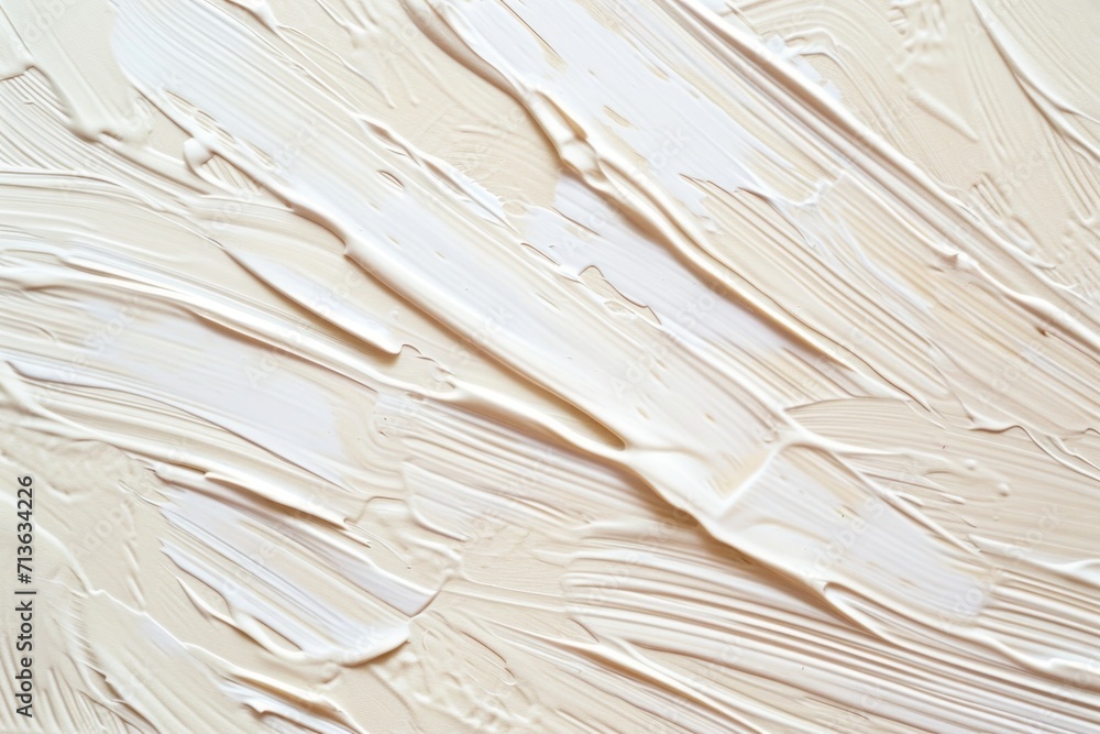 Poster a close-up view of dynamic white paint strokes on a surface, creating a textured appearance.