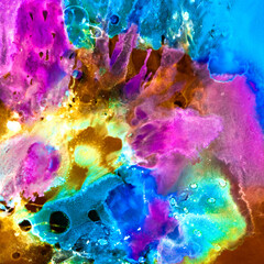 Vibrant, colorful and fluid abstract paint texture background in a modern and contemporary style with shades of blue, magenta, yellow, cyan