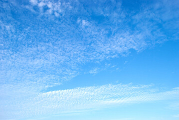 gentle air clouds in the blue sky