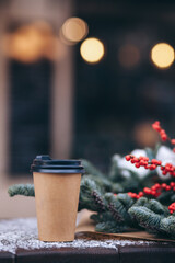 cup of coffee with christmas tree branches