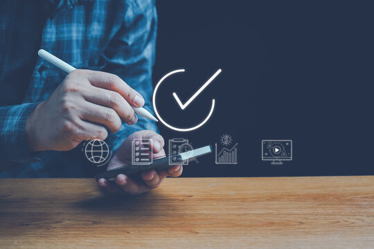 Quality Assurance Concept, Businessman shows sign of top service Quality assurance, Guarantee, Standards, ISO certification and standardization concept, satisfaction, high quality, service experience.