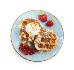 Tasty Belgian waffles with ice cream, berries and caramel syrup on white background, top view