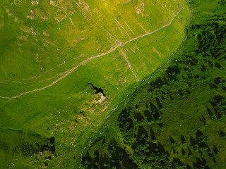 Green grassy mountains landscape Georgia - Aerial photo background