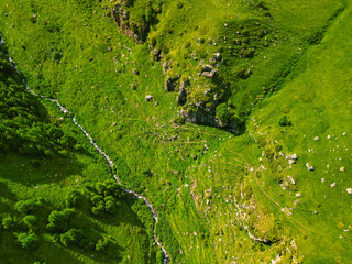 Green grassy mountains landscape Georgia - Aerial photo background