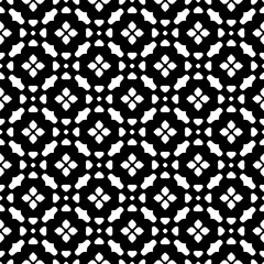 White background with black pattern. Seamless texture for fashion, textile design,  on wall paper, wrapping paper, fabrics and home decor. Simple repeat pattern.