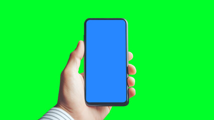 Male using Hand holding smartphone touching green screen background.