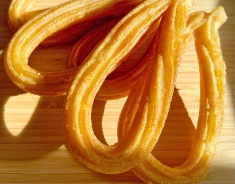 Traditional Spanish churros on a plate