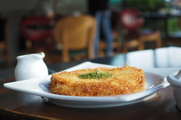 Turkish dessert kunefe, kunafa, kadayif with pistachio 