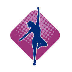 Silhouette of a female dancer in action pose. Silhouette of a slim woman in dancing pose.