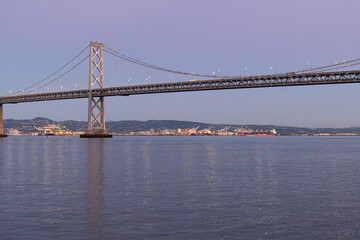 Fototapeta na wymiar Sunset View of the San Francisco Bay Bridge from the Piers
