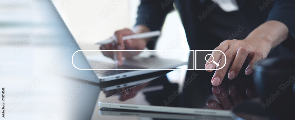 Aufkleber seo, search engine optimization. woman typing on laptop computer keyboard, using digital tablet sear