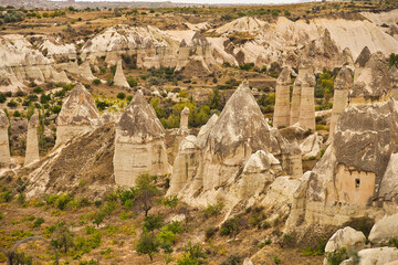 The unique rock caves, fairy chimneys and rock pillars in the Red valley seen from the Panoramic...