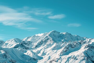 Fototapeta na wymiar Majestic mountain range with snow peaks and clear blue sky