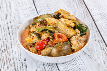 Thai red spicy curry with chicken