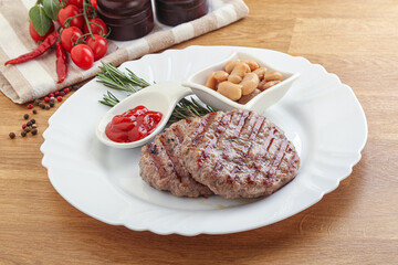Grilled beef burger cutlet with sauce