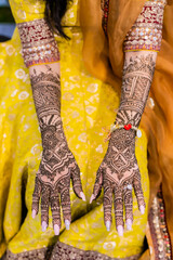 Indian bride's henna mehendi mehndi hands close up