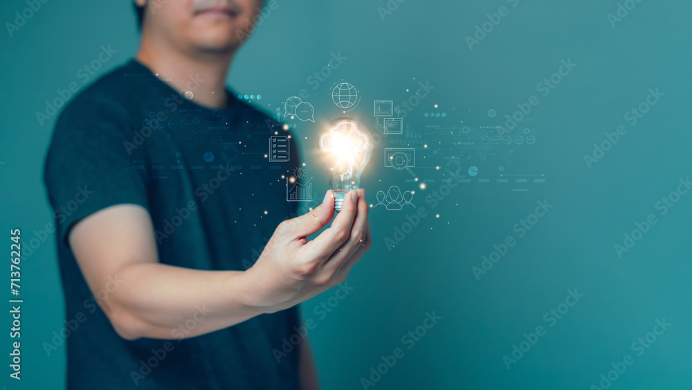 Poster man hold a light bulb and light up the light connecting the internet around the world. global intern