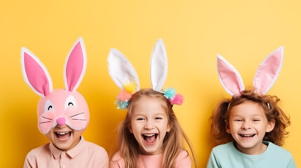 Happy children in bunny ears celebrating easter