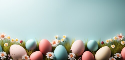 easter eggs in the grass with light color background, copy space text