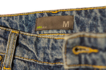 Krasnodar, Russia, 25 December 2023. Label of Sela denim jeans size M close-up. Selective focus