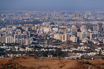 Fototapeta premium 19 January 2024, Cityscape Skyline, Cityscape of Pune city view from Bopdev Ghat, Pune, Maharashtra, India.