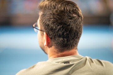 sports fan watching tennis in summer