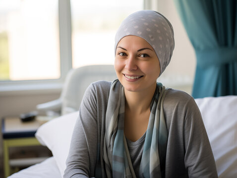 Woman wearing chemo hat smiling at the camera in hospital Cancer patient fighter Cancer Day. Generative AI