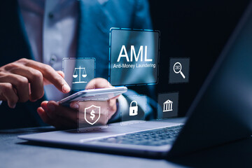 AML : Anti money laundering financial bank concept. businessman use laptop with virtual AML icon for anti money laundering regulations. - obrazy, fototapety, plakaty