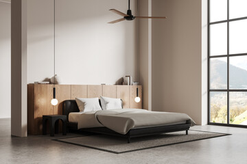 Modern hotel bedroom interior with bed and drawer, panoramic window