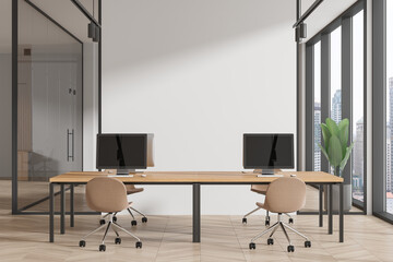 Workplace in white office interior