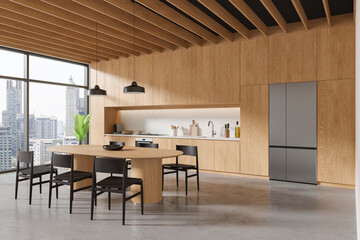 Cozy home kitchen interior with dining table and cabinet, panoramic window