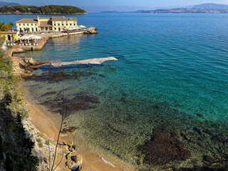 Romantic backstreet, side street or alleys in historic old town of Corfu Island, Greece with...