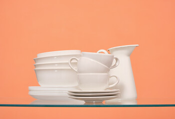 White dishes assortment. Elegant dinnerware. Eating utensil set.