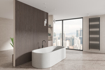 Stylish hotel bathroom interior with bathtub, shelf and panoramic window