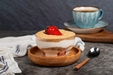 Strawberry magnolia dessert. Magnolia dessert in bowl on dark background