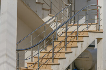 outdoor staircase with stainless railings in the house 2