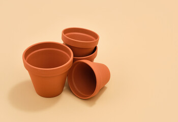 Empty brown clay pots for growing flowers. Copy space for text.