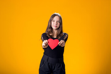 Child girl holding paper heart. Love, Valentine day concept
