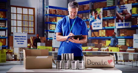 Food Bank Humanitarian Aid In Donation Boxes
