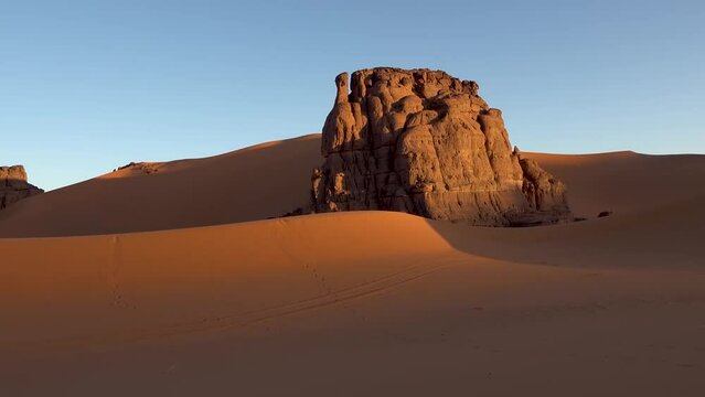 The Sahara desert dry valleys, mountains, salt flats, barren and rocky plateaus, and sand dunes.  desert spanning North Africa, the largest hot desert in the world and the third-largest desert overall