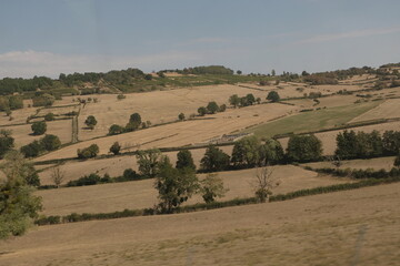 Obraz premium Various fields, wide lands, and valleys. With interesting colors, lines, and textures. Shot in France.