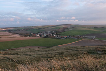 Various fields, wide lands, and valleys. With interesting colors, lines, and textures. Shot in France.