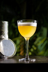 Luxury cocktail on the wooden table on a dark background