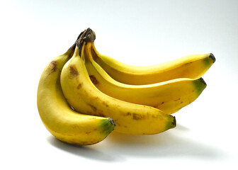 bananes sur fond blanc - obrazy, fototapety, plakaty
