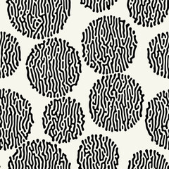 Fototapeta premium Vector seamless pattern. Random disposed organic shapes. Stylish structure with circles. Hand drawn abstract background. Can be used as swatch in Illustrator. Monochrome spotty print.