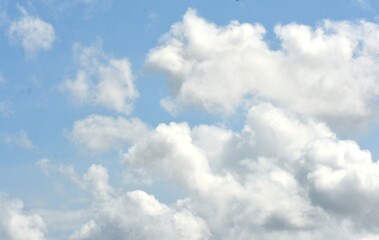 photo of white sky and bright blue clouds